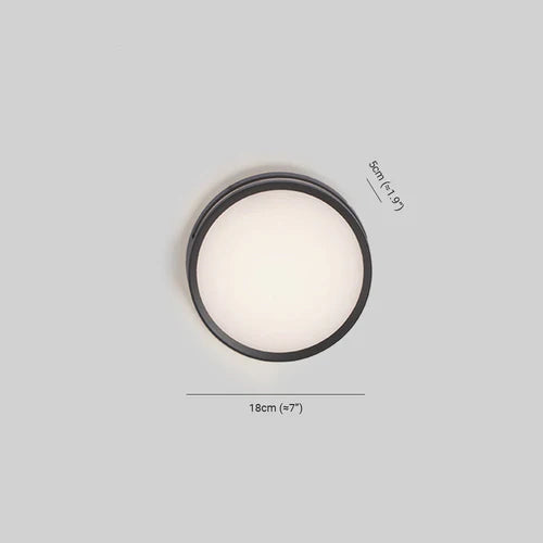 Round LED Metal Wall Light Outdoor Modern Design | Reylum