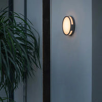 Round LED Metal Wall Light Outdoor Modern Design | Reylum